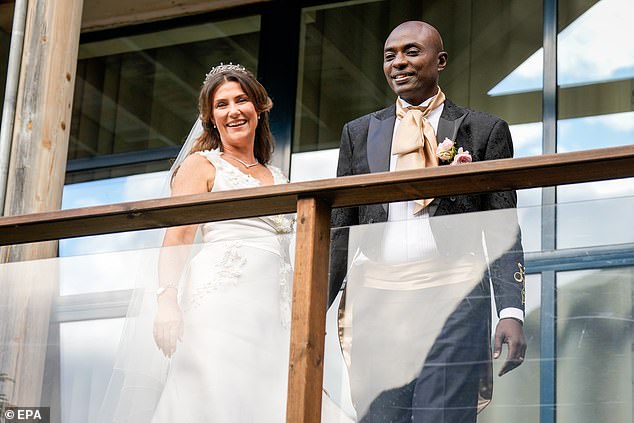 Princess Martha and her husband Durek greeted the crowd from a balcony