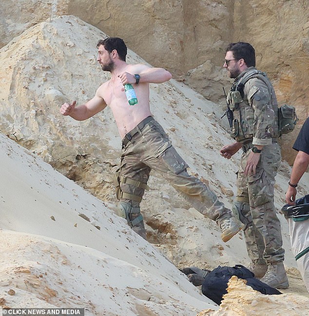 The actor struts through piles of sand in Wrotham, Kent