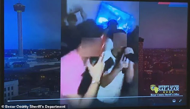 Police showed video of teenagers partying and dancing with guns in an empty house