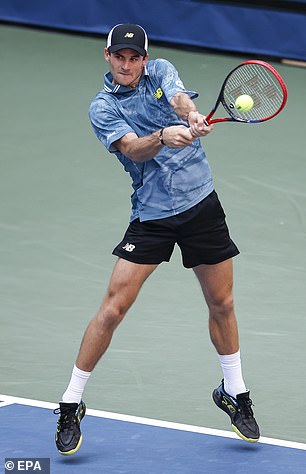 Paul plays a backhand against Diallo in the third round.