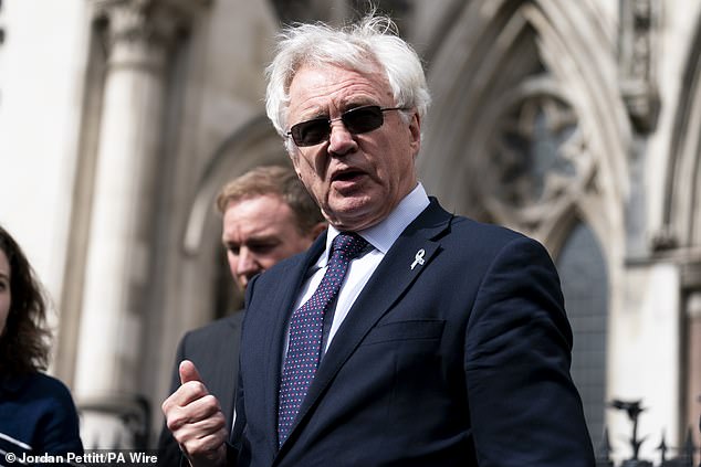 MP David Davis speaks to the media outside the Royal Courts Of Justice in London in March