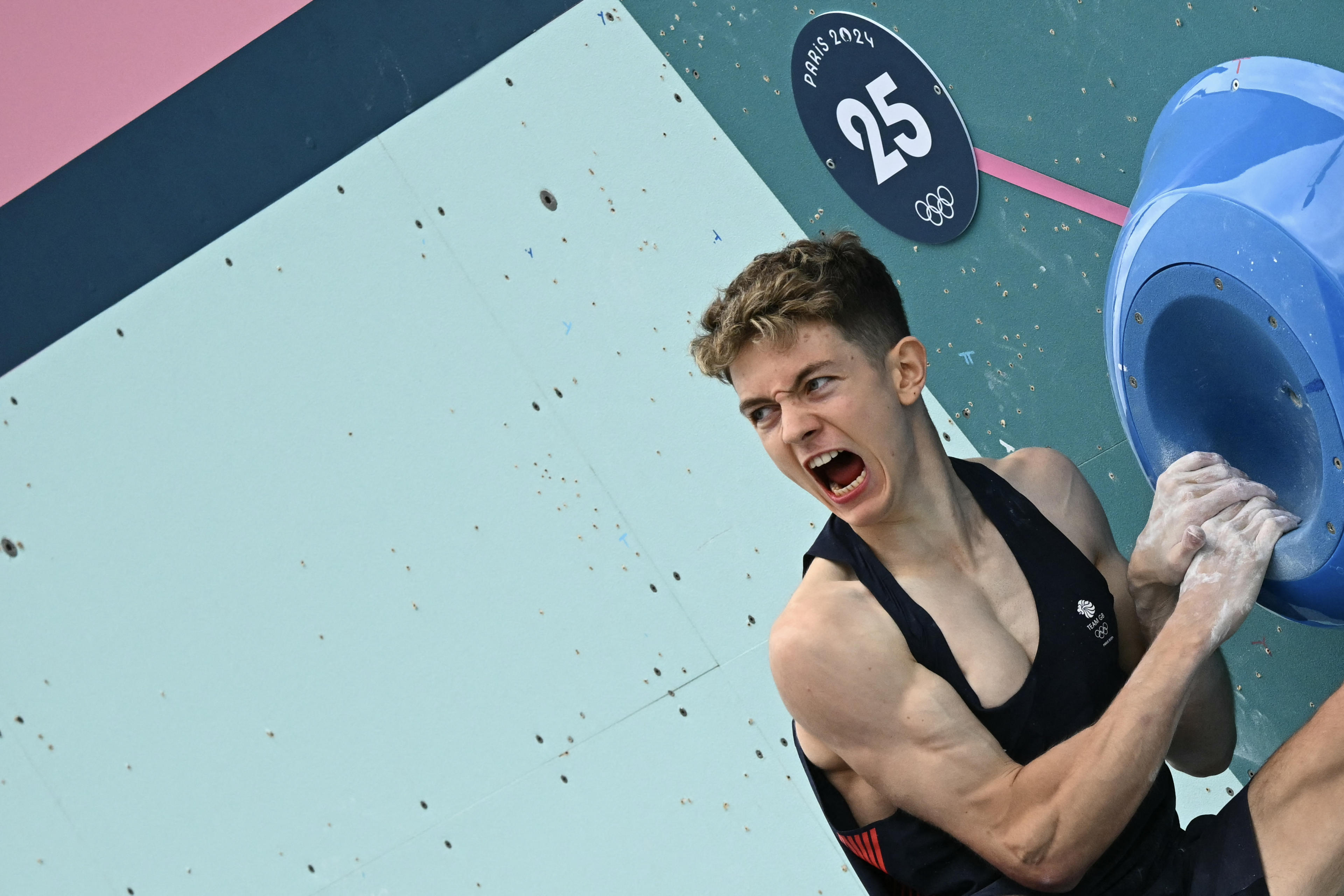 Britain's Toby Roberts competes in the men's bouldering sport climbing final during the Paris 2024 Olympic Games at Le Bourget Sport Climbing Venue in Le Bourget on August 9, 2024. (Fabrice Coffrini/AFP)