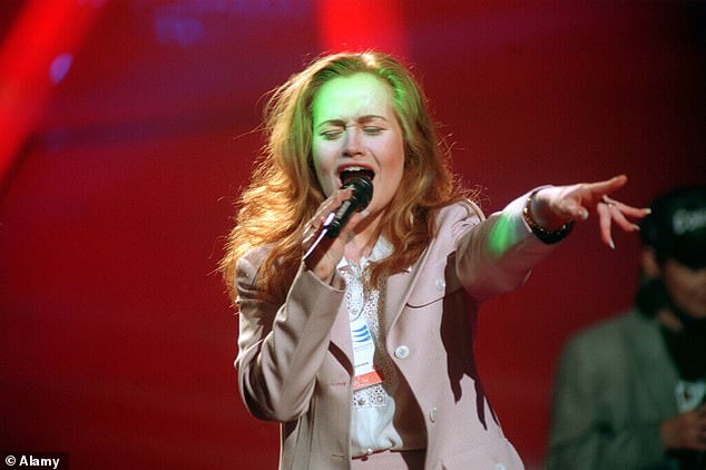 She starred as Sandy in a West End revival of the musical Grease and represented the UK in the Eurovision Song Contest three decades ago (pictured during Eurovision rehearsals in 1993).