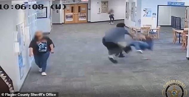 Surveillance video shows the 6-foot-6, 270-pound teen throwing Naydich to the floor in her special needs classroom before kneeling and punching her in the head and back.