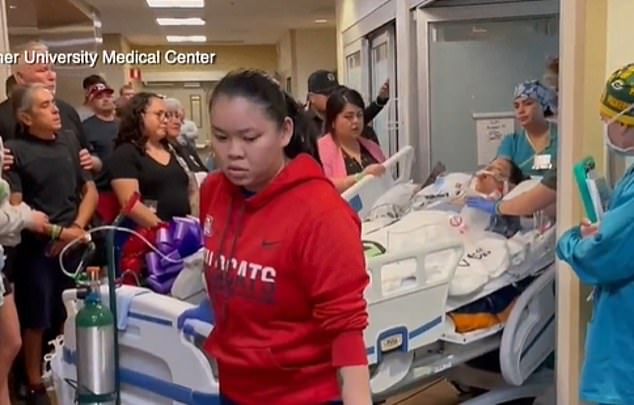 Zahriya is seen being taken out of her hospital room after being taken off life support.