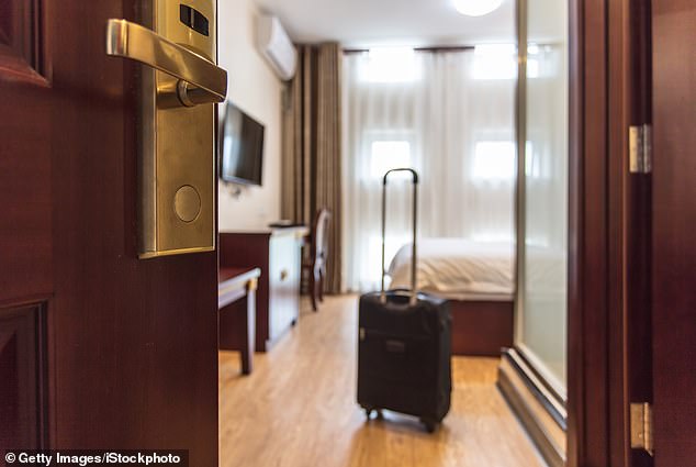 His routine begins by holding the door open with a suitcase while he searches the room.