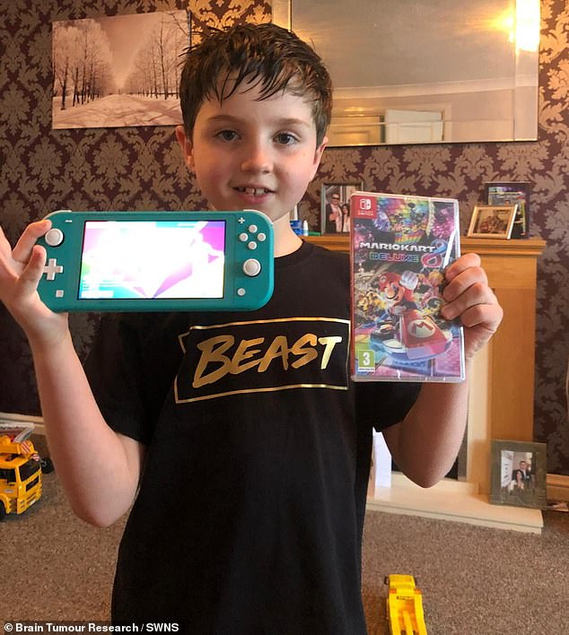 So when he started to suffer from neck pains, his GP simply ordered him to see a physiotherapist, saying it was because the 11-year-old was playing on his phone too much. Ronnie pictured with a video game and the Nintendo Switch handheld gaming console