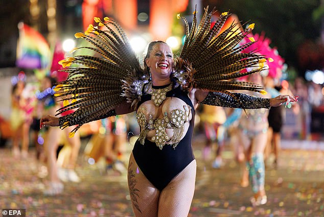 A prominent gay rights activist has called for the Prime Minister to be banned from attending Gay Mardi Gras over an apparent change of heart on the census (pictured, a participant in the 2024 march)