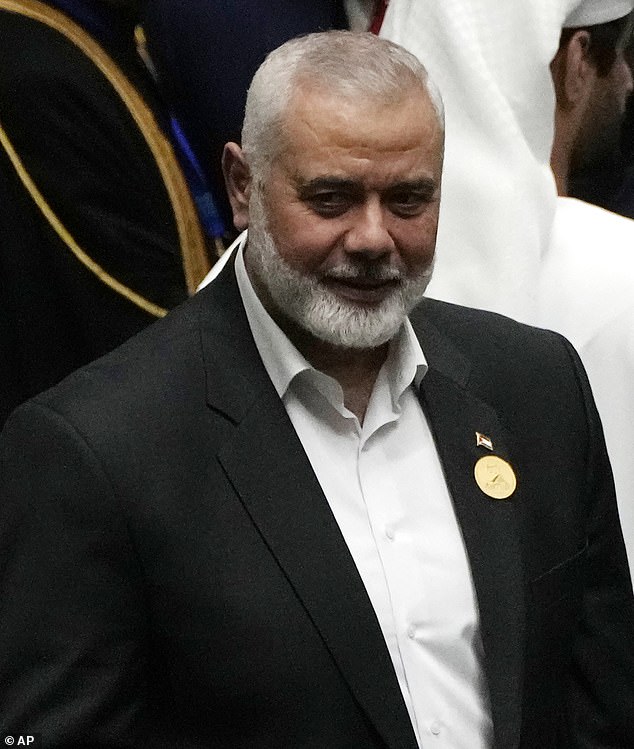 Hamas chief Ismail Haniyeh arrives at the Iranian parliament to attend the swearing-in ceremony of newly elected President Masoud Pezeshkian, in Tehran, Iran, Tuesday, July 30, 2024, hours before his death.