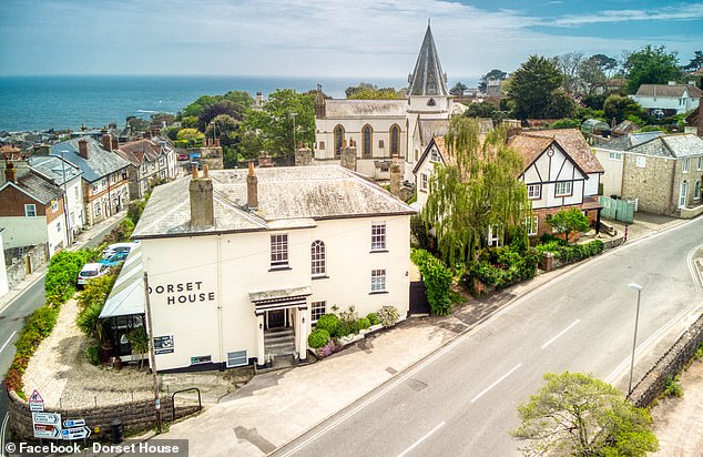 Pictured is the terraced house Dorset House in Lyme Regis, where 