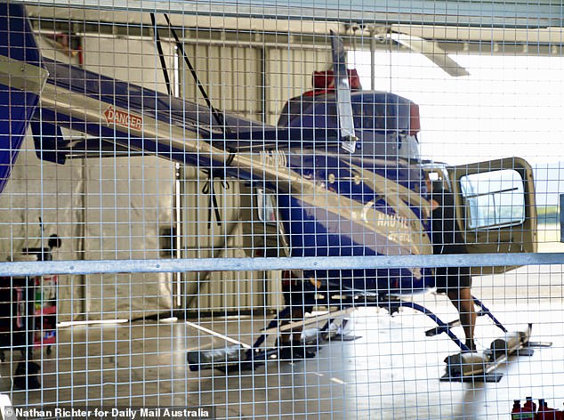 Nautilus helicopter in the hangar where Blake Wilson stole an R44 Robinson aircraft in the early hours of Monday morning and flew it for four minutes before crashing into the Double Tree