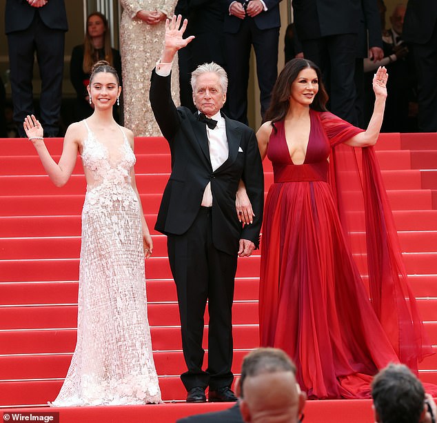 In addition to Dylan, Zeta-Jones and Michael also share a daughter, Carys, 21 (pictured left with her mother and father at the Cannes Film Festival last year).