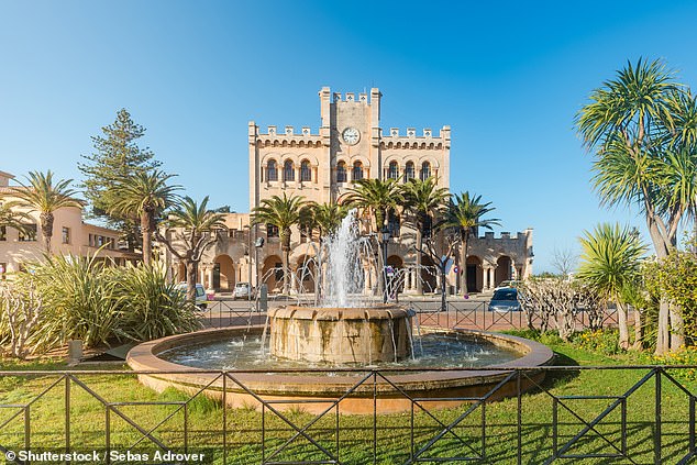 Wendy says: 'The main square, Plaça d'es Born, lined with historic buildings such as the former castle turned town hall (above) and the baroque-style church of Sant Francesc, is a great place to stop.'