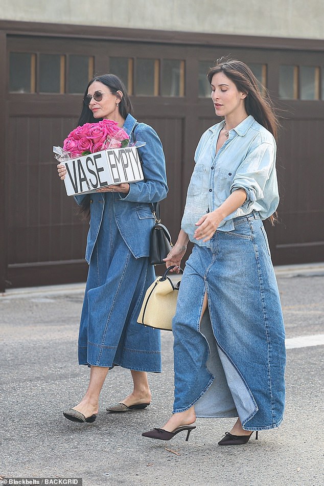 The mother-daughter duo coordinated their looks -- whether on purpose or by chance -- in head-to-toe denim ensembles.