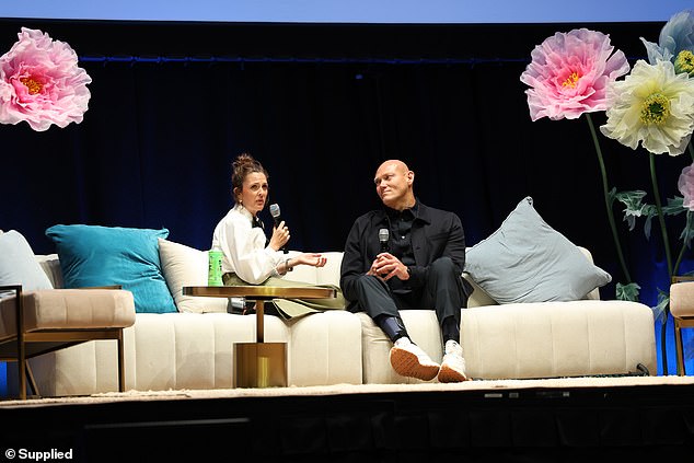 Drew thanked her Australian beauty team for making sure she looked her best on stage. Pictured with Australian swimmer Michael Klim