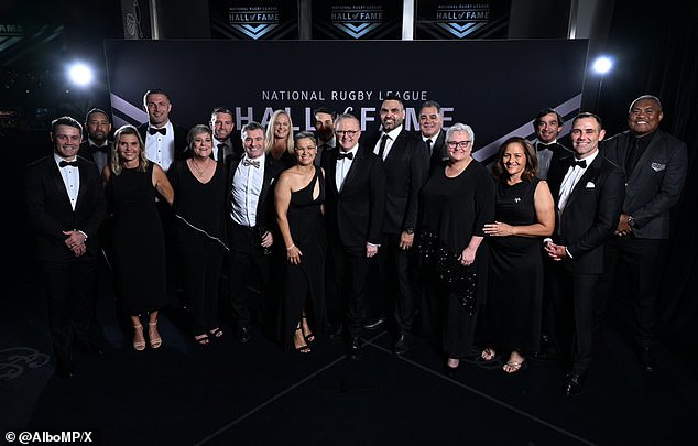 Albanese (pictured middle) presented Coote with his individual award before rushing back to Canberra for more pressing matters.