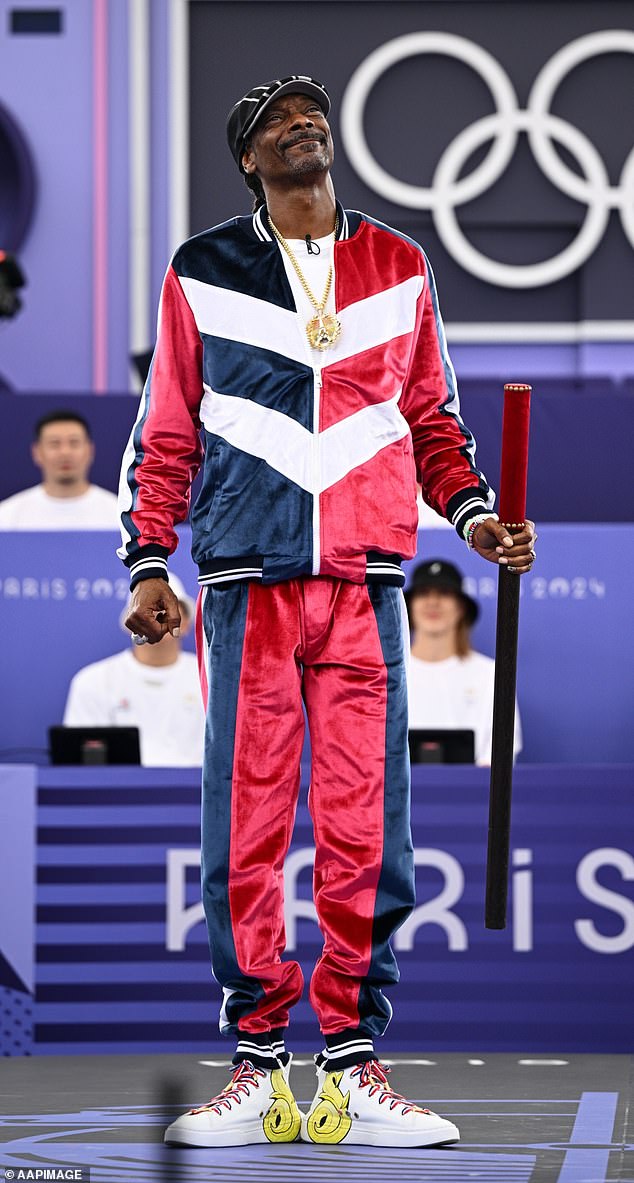 Snoop Dogg, 52, kept up his patriotic gear for the 2024 Paris Olympics, wearing mostly red, white and blue for Team USA.