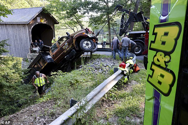 The driver, Joshua Polewarzyk, 37, of Limington, attempted to cross the 183-year-old bridge when its wooden deck gave way, causing the vehicle to plunge into the river.