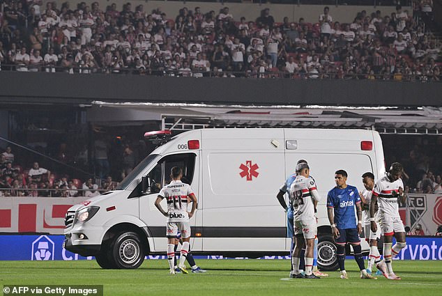 An ambulance takes Izquierdo off the field during the Copa Libertadores match in Sao Paulo