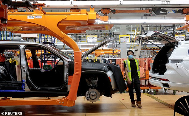 Some workers may be given other positions or jobs at other plants (pictured: an assembly worker at the Mack plant in Detroit)