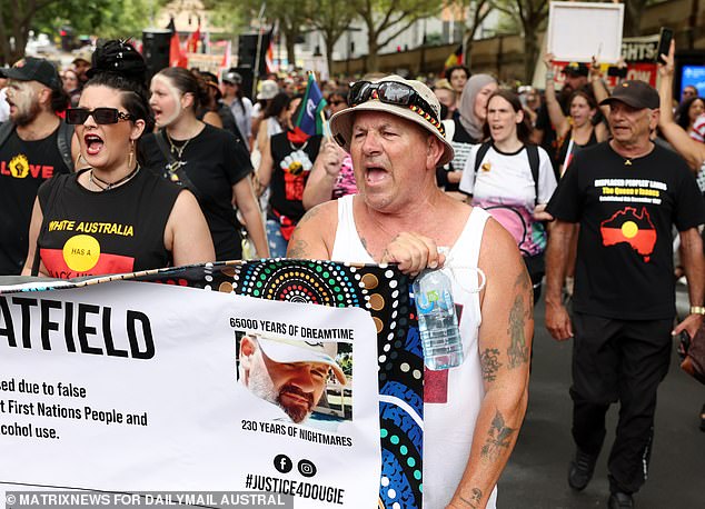 Pictured: People in Sydney protesting at an Invasion Day rally on January 26.