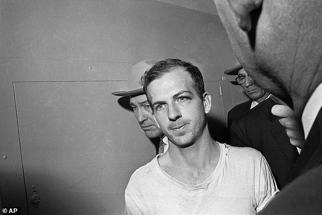 Some experts say the documents will show the CIA helped Lee Harvey Oswald (pictured) carry out the attack.