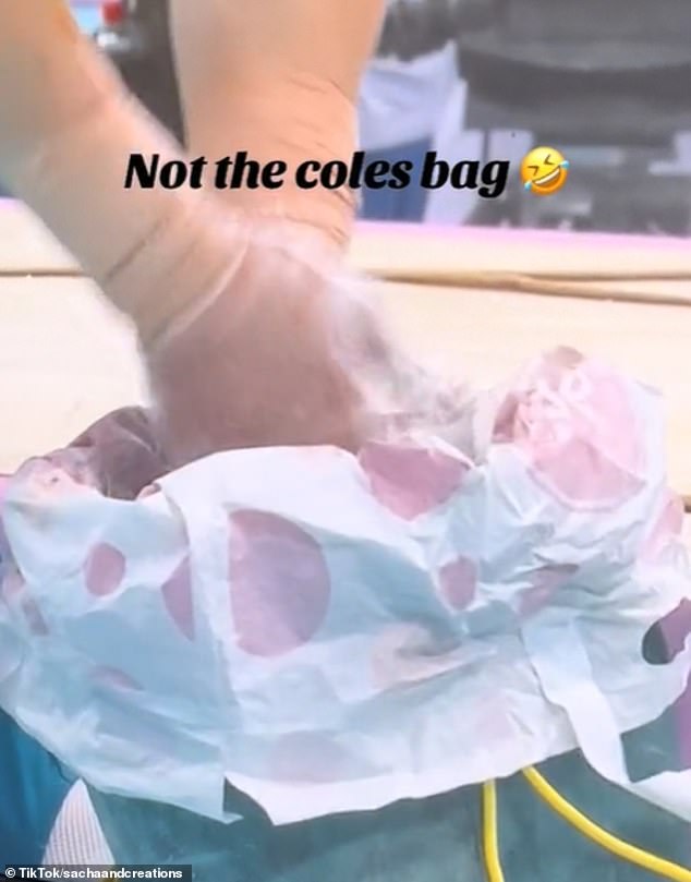 Moore was seen using a Coles plastic bag to store her chalk, which gymnasts use to ensure they don't lose their grip during a routine.