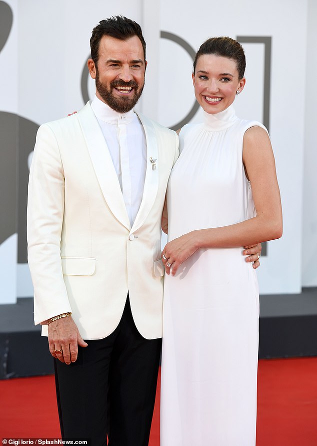 At the Beetlejuice premiere, The Leftovers star wore a bespoke cream Zegna suit jacket with a high-collared shirt. He accessorized with Tiffany & Co. jewelry and sported a scruffy beard.