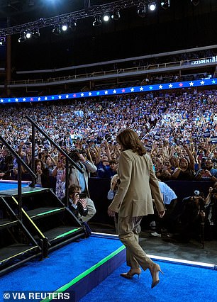 Harris almost suffered an embarrassing stumble while jumping down the stairs at a rally in Arizona