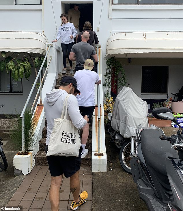 Australian renters are struggling not only to find rental accommodation, but also to afford it (pictured, prospective tenants queue to inspect a unit)