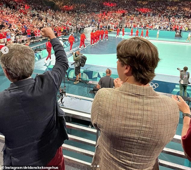 During the match, Frederik and Christian were in high spirits as they cheered on the men's handball team.