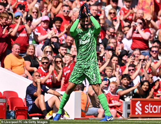 Liverpool goalkeeper Alisson Becker pictured applauding fans at Anfield during a friendly on Sunday