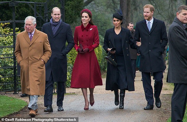 Meghan Markle is photographed arm in arm with her husband, Prince Harry, alongside Prince William, Kate and King Charles (who was then a prince) in 2018.