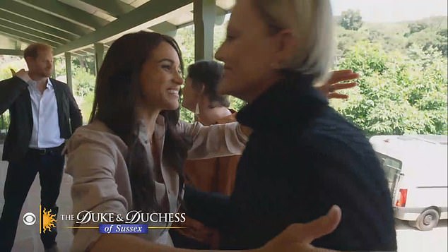 The interview shared today by the American network CBS featured a clip of Meghan hugging her grieving parents (pictured)