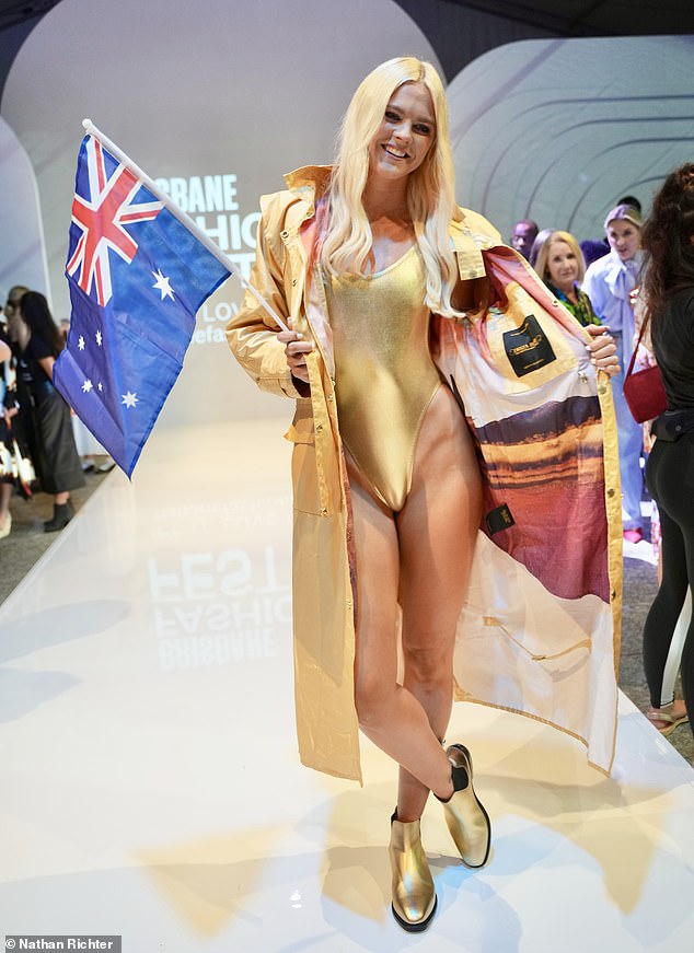 The 25-year-old swimmer walked the catwalk for Driza-Bone at the Brisbane Fashion Festival on Tuesday.