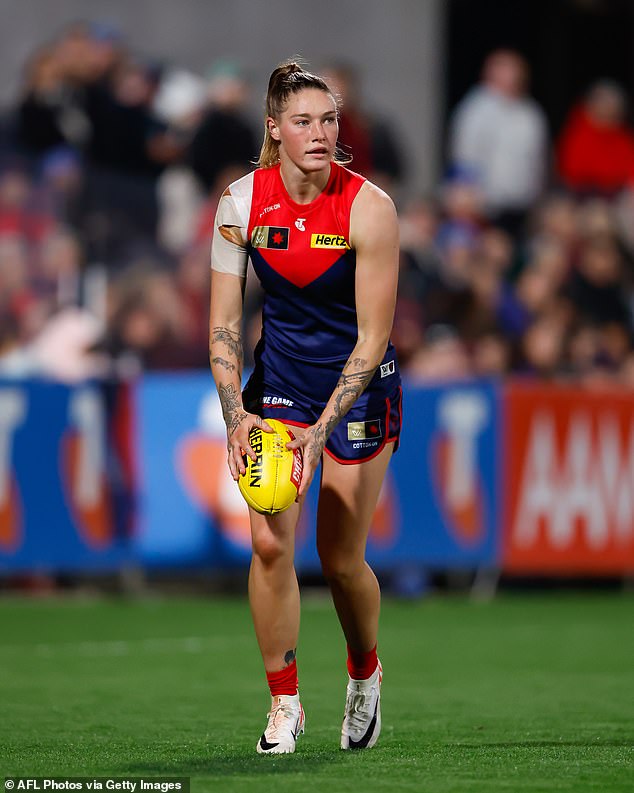 Some have questioned whether Harris (pictured) should have gone to Paris, given the AFL Women's season starts in three weeks and she is struggling to recover from a shoulder injury.