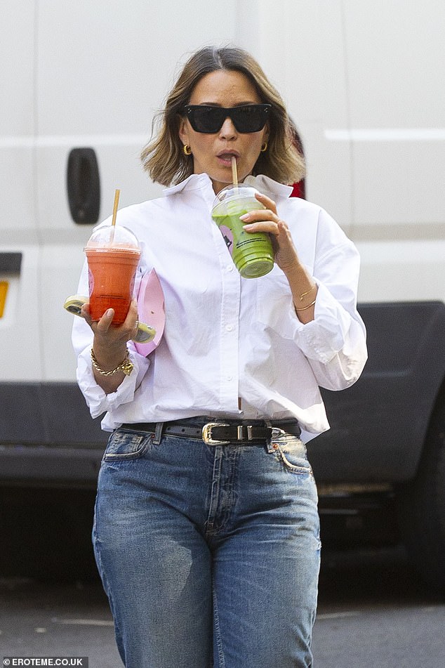 He looked in good spirits as he took a sip of his drink after purchasing two smoothies from Joe & The Juice.