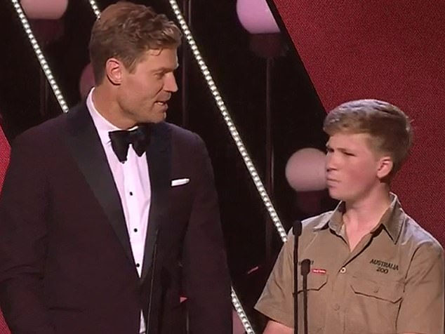 The 20-year-old reality TV host, who has been nominated for a Gold Logie award at this year's upcoming awards, revealed the hilarious mishap he had after eating a sweet without realising it contained alcohol. Pictured: Irwin with Dr Chris Brown at the 2018 Logies Awards