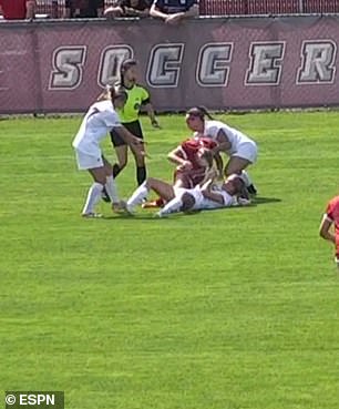 Lamond pulled Girman's hair as they wrestled on the ground.