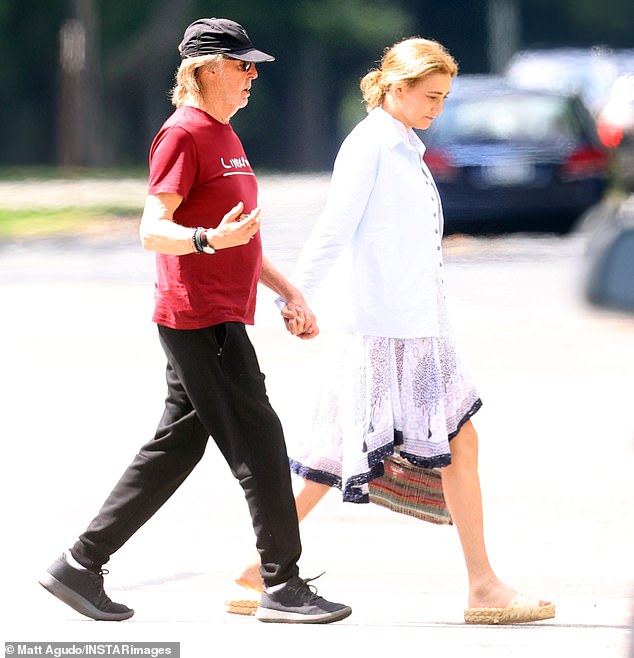 The Beatles singer, 81, treated his wife of 13 years, 64, to a refreshing drink as they enjoyed some quality time together in the sunshine.