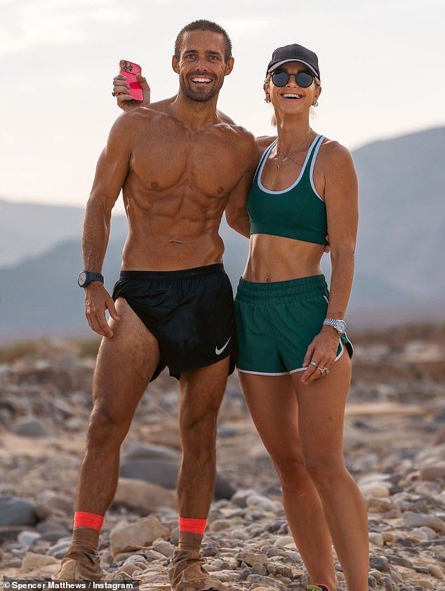 His wife Vogue showed off her incredible figure in green sportswear as she posed for snaps with Spencer at the end of the race.