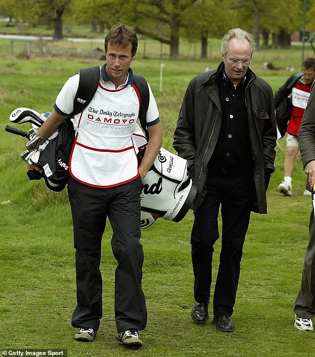 Sven-Goran Eriksson is pictured with his son Johan, who caddied for Swedish golfer Johan Edfors at a tournament in the Forest of Arden, Warwickshire, in May 2004.