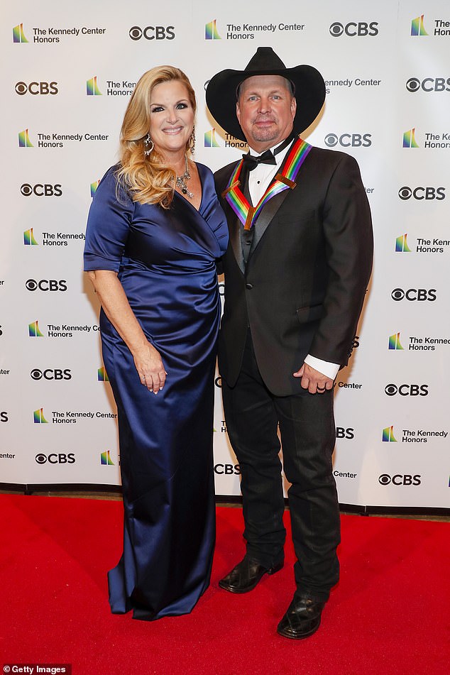 The musician (seen with his wife, Trisha Yearwood), 62, is reported to be worth $430 million thanks to his impressive music career.