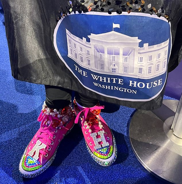 'Kamala said "Ladies, watch your feet, there is glass on the floor."Jacobs said her Harris-inspired Converse referenced the breaking of the glass ceiling. Her dress also featured an image of the White House.