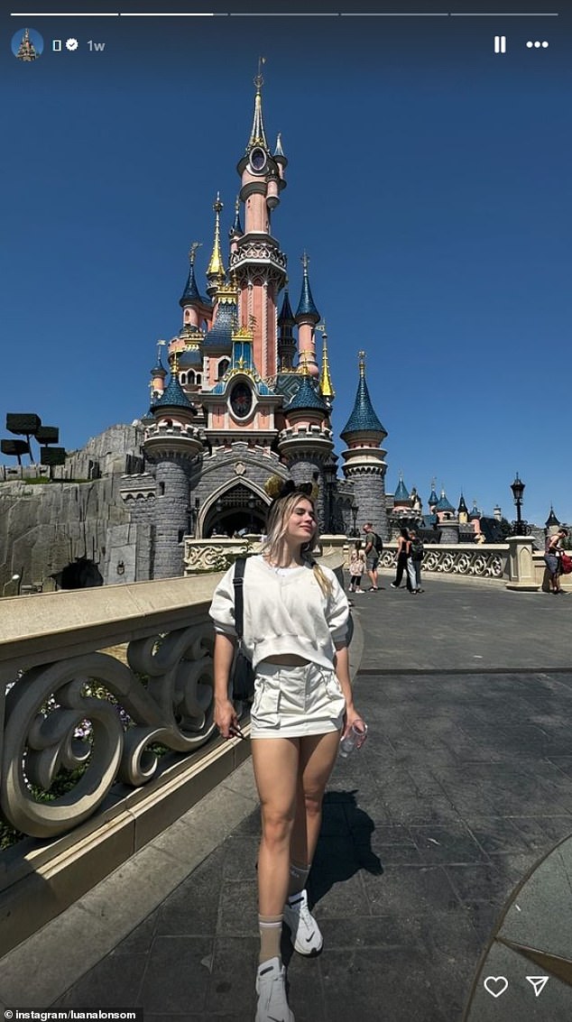 During her stay in Paris she also made a visit to Euro Disney posing with a pair of Mickey Mouse ears in front of the Magic Kingdom castle.