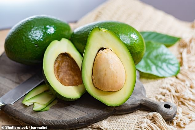 Adding a layer of oil to an opened avocado also helps it retain moisture, making it less likely to rot (Stock image)