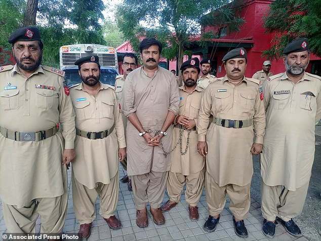 This comes two years after an American vlogger claimed she was gang-raped in a Pakistani hotel by her guide and an accomplice (one of whom is pictured handcuffed in the photo above) who recorded videos of her for blackmail.