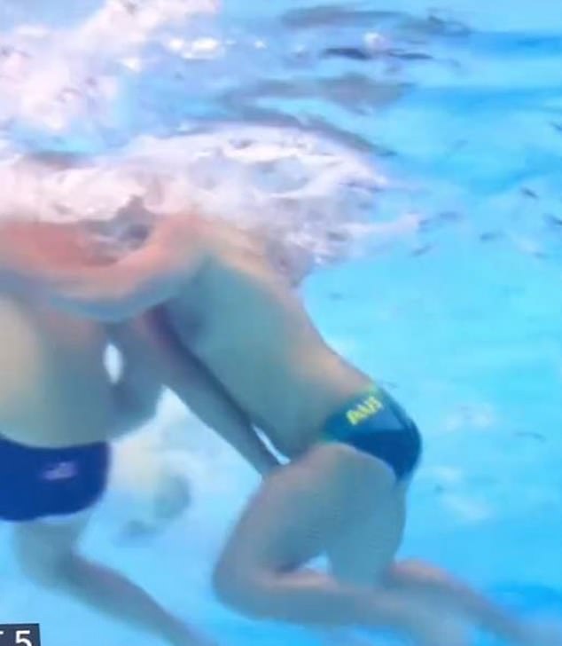 An American water polo player appeared to grab his opponent's swimsuit underwater