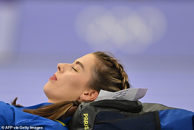 The gold medal winner was super relaxed at times, even appearing to take naps in her sleeping bag while waiting for her turn to jump.