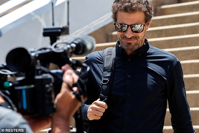 Rodolfo Sancho, a Spanish actor, walks after a Thai court sentenced his son, Daniel Sancho Bronchalo, to life for the high-profile murder